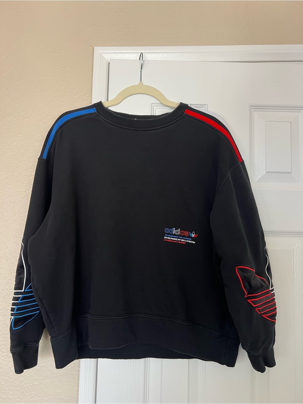 adidas women’s Black Crewneck Sweatshirt with Red & Blue Trim